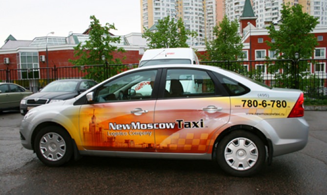Оклейка такси плёнкой фото